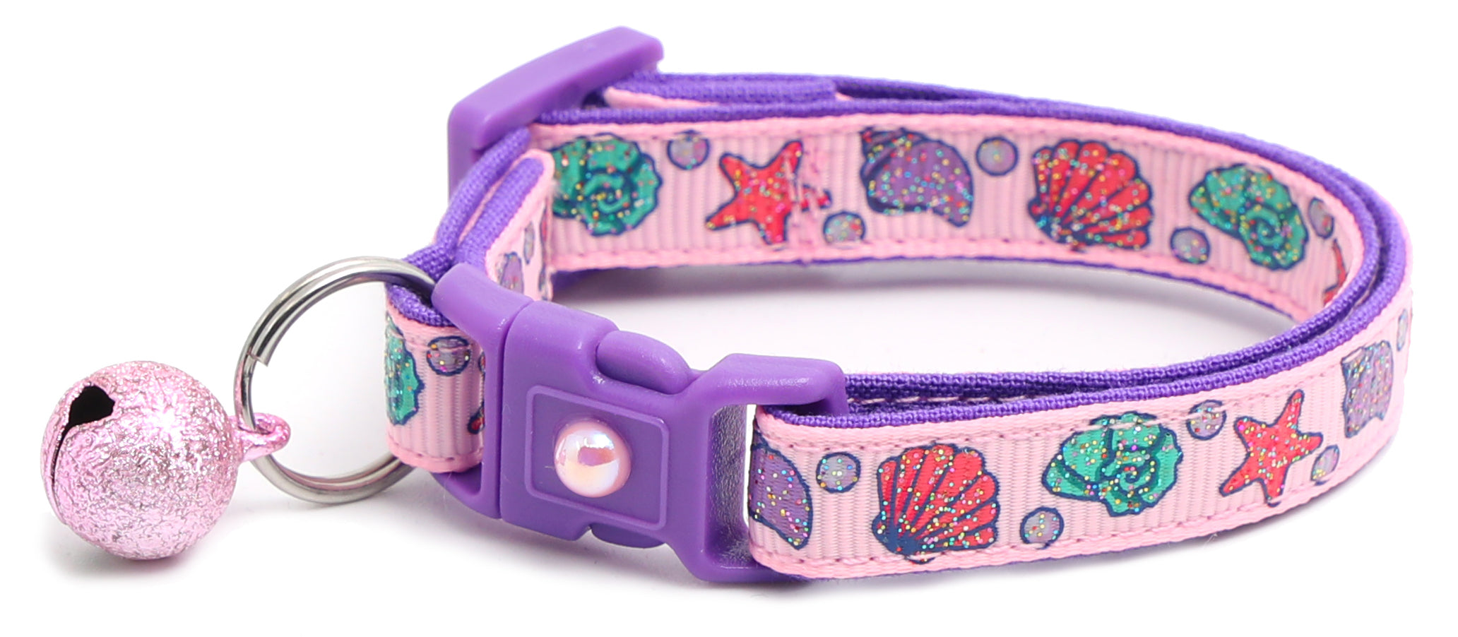 Beachcomber Breakaway Cat Collar in vibrant colors, featuring a breakaway clip and removable bell, made from soft reinforced cotton.